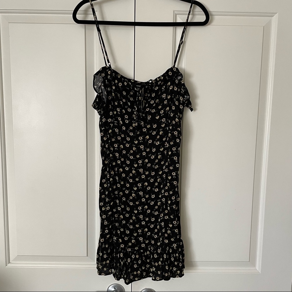 Free People black floral slip dress with buttons on the side